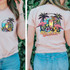 Five O Clock Somewhere DTF Heat Transfer on a pink T-shirt featuring tropical elements, flamingos, flowers, and a colorful drink with the phrase 'Five O Clock Somewhere'.