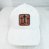 Triple Cross Leather Hat Patch, white baseball cap with brown leather patch featuring three crosses design.