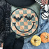 Checkered Halloween Happy Face Screen Print Heat Transfer, black bat and smiley face design on orange and gray checkered background.