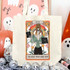 The Work From Home Mom Skeleton DTF Heat Transfer, a tote bag featuring a colorful illustration of a skeleton woman with a bun hairstyle, holding a laptop and a tablet, surrounded by floral and celestial elements.