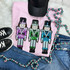 Nutcracker Sequins Embroidered Patch Bundle, colorful sequined nutcracker patches with detailed embroidered design on a pink shirt, paired with blue denim jeans, black sneakers, pink and teal beaded necklace, and black glittery hat.