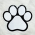 Dog Paw White Chenille Patch, embroidered white pet paw print patch with black border on a white furry background.