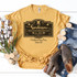 Sanderson Bed and Breakfast Sublimation Transfer, black decorative design with skull and crossbones, vintage hats, children's safety message, and establishment date on yellow T-shirt.