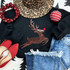 LARGE Sequin Reindeer Chenille Patch, a festive holiday clothing accessory with a red sequin reindeer design on a black sweatshirt.