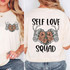 Self Love Squad DTF Heat Transfer, design featuring a heart made of flowers and skeleton hands, on a white t-shirt