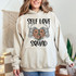 Self Love Squad DTF Heat Transfer, hoodie with floral and skeletal design with text print