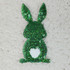 Green Sequin Bunny Pocket Sized Patch, decorative patch with shiny green sequins in the shape of a bunny with a heart-shaped cutout on its belly, designed for clothing or accessories embellishment.