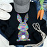 Adult Rainbow Bunny Sequin Patch, colorful rainbow bunny sequin patch on black sweatshirt, embellished with vibrant, shimmering rainbow colors.