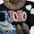 Leopard XOXO Chenille Sequin Patch, colorful patch with leopard print pattern on black clothing.