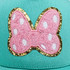 Pink Bow POLKA DOTS Glitter Chenille HAT/POCKET Patch, close-up of a pink embroidered bunny with polka dots outlined with gold glitter on turquoise fabric.