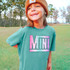 Multi-Color Checkered Mini DTF Heat Transfer, colorful checkered pattern on a child's T-shirt.
