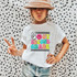 Peace Out Second Grade DTF Heat Transfer, colorful and playful school-themed design with a peace sign, smiley face, and vibrant lettering for children's clothing.