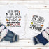 Heading to the patch ADULT Old Town Road parody Sublimation Transfer, white T-shirts with Halloween-themed text and graphics, paired with denim jeans and sneakers on a white wooden background.