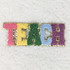 TEACH Chenille & Glitter Hat/Pocket Embroidered Patch, colorful embroidered patch spelling 'TEACH' with pink, yellow, green, blue, and purple chenille and glitter details on a white surface.