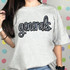 Generals Sequin Patch, a sparkly embroidered patch with the word 'generals' in black outline and colorful sequins, on a gray t-shirt.