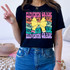 Eleventh Grade Coquette Pencil Bow DTF Heat Transfer, colorful graphic t-shirt with a yellow bow and vibrant text design.