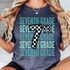 Seventh Grade Checker DTF Heat Transfer, a design featuring the text "Seventh Grade" repeated several times in blue and teal colors with a large checkered number 7 and the word "the" overlayed.