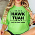 Hawk Tuah BLACK Screen Print Heat Transfer, a green t-shirt with black printed text and stars.