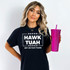 Hawk Tuah WHITE Screen Print Heat Transfer, white printed design on black T-shirt worn by woman holding a pink metallic tumbler with straw.