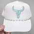 RHINESTONE Bull Skull HAT/POCKET Embroidered Patch, white trucker hat with rhinestone-studded bull skull embroidery, and turquoise gemstone beaded chain accent.