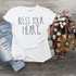 Bless Your Heart Sublimation Transfer, white T-shirt with 'Bless Your Heart' printed design along with a small red heart on the front.