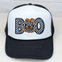 Checkerd BOO Embroidered Hat with Pocket Patch, black and white trucker cap with a pumpkin face embroidery on the front, decorative patch design for fall or Halloween.
