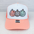 Ho Ho Ho Christmas Ornaments Embroidered HAT/POCKET Patch, pink and white trucker hat with embroidered Christmas ornament designs and 'Ho Ho Ho' lettering.