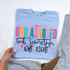 Undiagnosed But Somethin Aint Right DTF Heat Transfer, colorful and humorous graphic design on a light blue T-shirt.