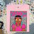 Seminoles Colorful Mascot DTF Heat Transfer, vibrant and colorful design of a Seminoles mascot with star-shaped sunglasses and pink hair, on a pink T-shirt.
