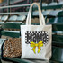 Checkered Mama Softball Bow DTF Heat Transfer, tote bag with a knitted pattern and a yellow bow design.