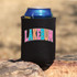 Lake Bum Colorful DTF Heat Transfer, a vibrant sticker on a black can cooler, designed with bright pastel colors spelling 'LAKEBUM' on a textured surface.