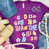 God Is Greater Than The Highs and Lows Fluffy Patch, colorful flower and text graphic on purple oversized T-shirt with casual accessories including denim cap, earrings, beads, jeans, and shoes.