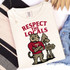 Respect Your Locals - PICK YOUR TEAM DTF Heat Transfer, T-shirt with a cartoon tiger wearing a red shirt and standing next to a tree with a sign that says 'Tuttle'.