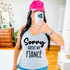 Sorry About My Father DTF Heat Transfer, a woman wearing a gray tank top with the text "Sorry About My Fiance" in black letters, and a pink cap with a smiley face logo, taking a mirror selfie.