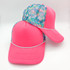 Neon Pink Flamingo Foam Trucker Hat, a vibrant pink foam trucker hat with a multicolored floral mesh front panel and a curved brim.