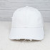 White Pacific Hybrid Denim Cap, stylish distressed white denim baseball cap with frayed edges and adjustable strap.
