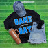 Game Day with Silicon Laces Patch - 10 Colors, sports-themed apparel and accessories, including a black sweatshirt with blue and white patch design, a denim cap, distressed denim shorts, and a brown thermos, all laid out on a green football field background.