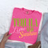 Tequila Lime And Sunshine DTF Heat Transfer, colorful quote design on a pink t-shirt reading 'Tequila Lime And Sunshine' with decorative stars.