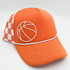 White Silicone Basketball HAT/POCKET Patch, orange baseball cap with a basketball design patch and checked patterned sides.