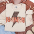 Patterned Names DTF Heat Transfer, T-shirt with a bold lightning bolt graphic and the word 'Nice' in colorful, patterned text, designed for customizable apparel.