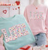 LOVE Multicolor Heart Fluffy Valentine's Day Patch, embroidered colorful heart designs spelling out LOVE on pastel pink and blue sweatshirts.