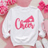 Cheer Fluffy Textured Patch - 4 Colors, white sweatshirt with pink fluffy textured patch spelling 'Cheer' and a cheerleading pom-pom design.