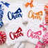 Cheer Fluffy Textured Patch - 4 Colors, colorful embroidered cheer patches on white sweatshirts with polka dot ribbons and pom-poms for cheerleading.