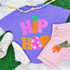 Hip Hop Felt Fabric Patch, colorful felt fabric patch with flowers and a carrot design on purple clothing.