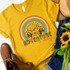 Adventure Is Calling ADULT Screen Print Heat Transfer, yellow t-shirt with a colorful mountain, sun, and cactus design and the phrase 'Adventure is calling'.