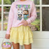 Crafting Eggs-tra Fun DTF Heat Transfer, colorful Easter-themed design on a pink sweatshirt featuring pixel art characters with Easter eggs.