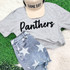 Panthers Fluffy Chenille Patch Transfer | Varsity Spirit Wear Patch with a grey sweatshirt featuring 'Panthers' and star-patterned denim shorts, paired with a beige baseball cap reading 'Game Day' on a green and white background.