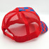Red & Royal Blue Checkered Foam Trucker Hat, front view showing mesh back and checkered pattern on front panel.