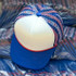 Patriotic Stripes Foam Trucker Hat, baseball cap featuring red, white, and blue patriotic stripe patterns with a foam front panel and a blue brim.