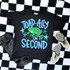 Toad-Ally On To Blue DTF Heat Transfer, colorful graphic T-shirt with a green and blue frog and stars on a black background.